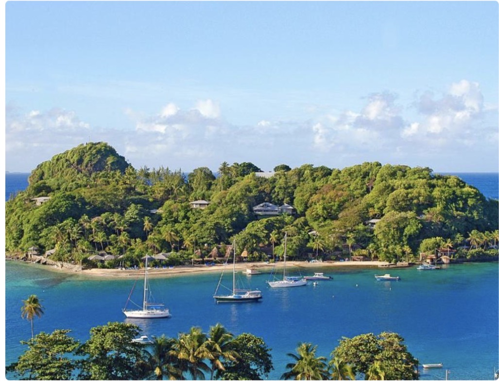 Lush Caribbean coastline and sheltered bay